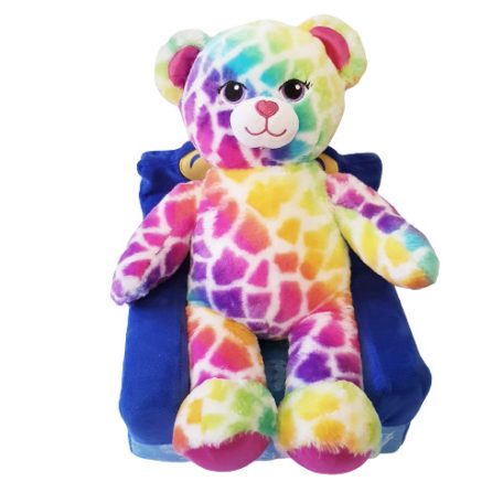 Build-A-Bear kék plüss fotel szivárványos mintás plüss macival szemből fotózva