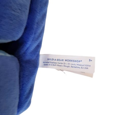 Eredeti fehér Build-A-Bear Workshop bevarrt gyári textil márka címke közelről
