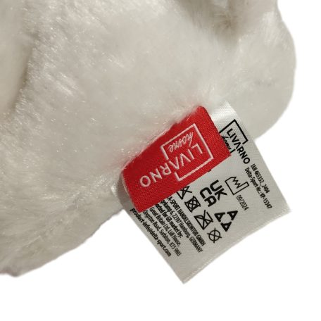 Eredeti piros Livarno Home bevarrt textil gyári címke a plüss egyszarvún