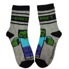 Egy pár Minecraft zombi mintás zokni egymás mellett kiterítve